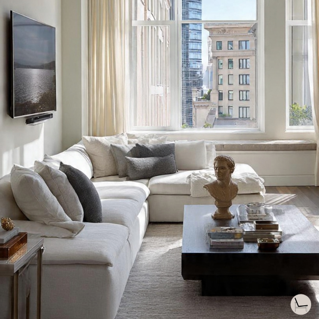 Bachelor pad living room furniture layout with optimal conversation seating arrangement