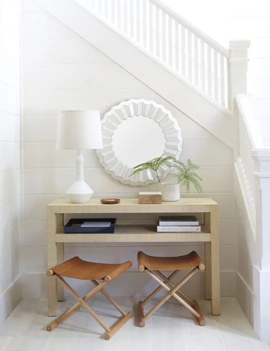 use the rule of three to decorate any sruface in your home. in sideboard devide the surface in three sections and add your accessories 