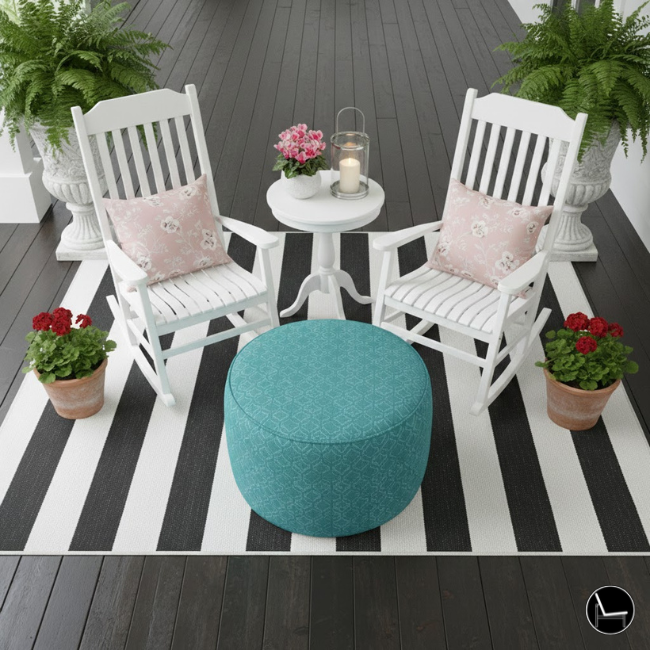 spring front porch outdoor rug anchoring seating area with rocking chairs and fern planters