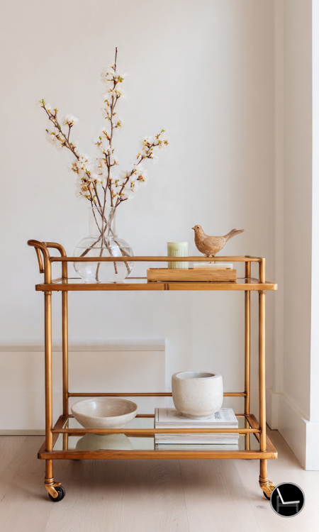 Seasonally styled bar cart with dried botanicals, autumn stems and natural textures